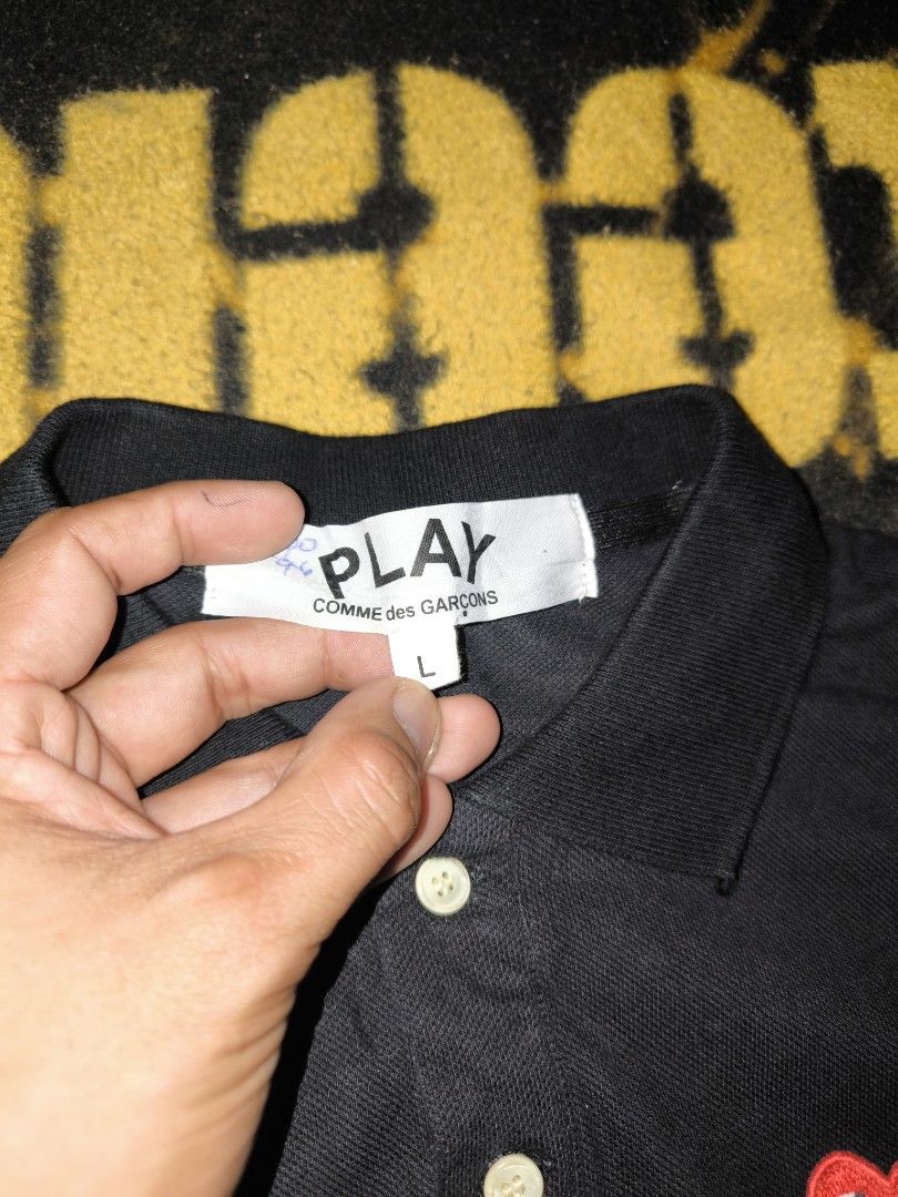 PLAY COMME des GARÇONS Polo shirt (Category: Tshirts & Polo Shirts ) located in Manila. Submitted by fljaoti27 (Listing ID 1463957362, Image 3). Description: Play Polo Shirt Large on tag best fit Small.
