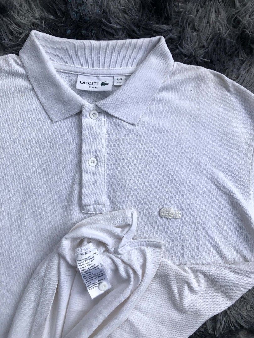 Polo (Category: Activewear) located in Manila. Submitted by gisterthrift (Listing ID 1463972488, Image 3). Description: Lacoste Polo Complete tags Off/Legit W: 23 L: 27/28 Excellent condition Color rate: 9.5/10 Issue: yellow stain kayo na bahala mag tanggal.