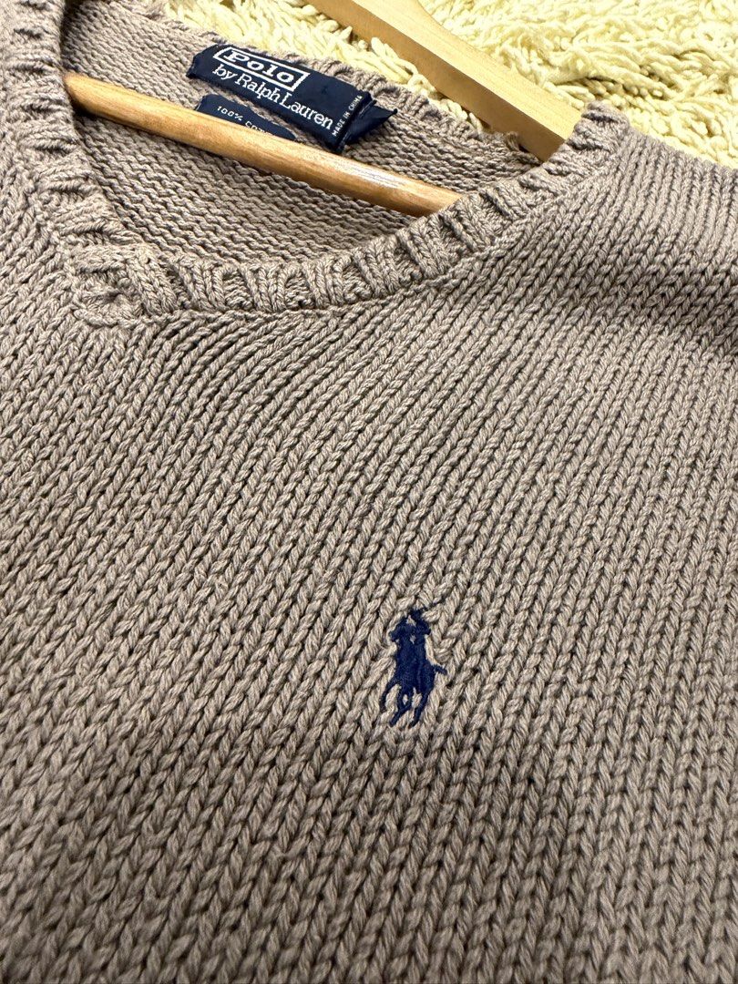 Polo Ralph Lauren knitted sweater (Category: Luxury Apparel) located in Baguio. Submitted by aginayagurang (Listing ID 1464053398, Image 3). Description: Polo Ralph Lauren Knitted Sweater Size: Large boxy Width: 22.5-23 inches Length: 25 inches Condition: 9/10 Issues: signs of usage (see pictures) Shipping available.