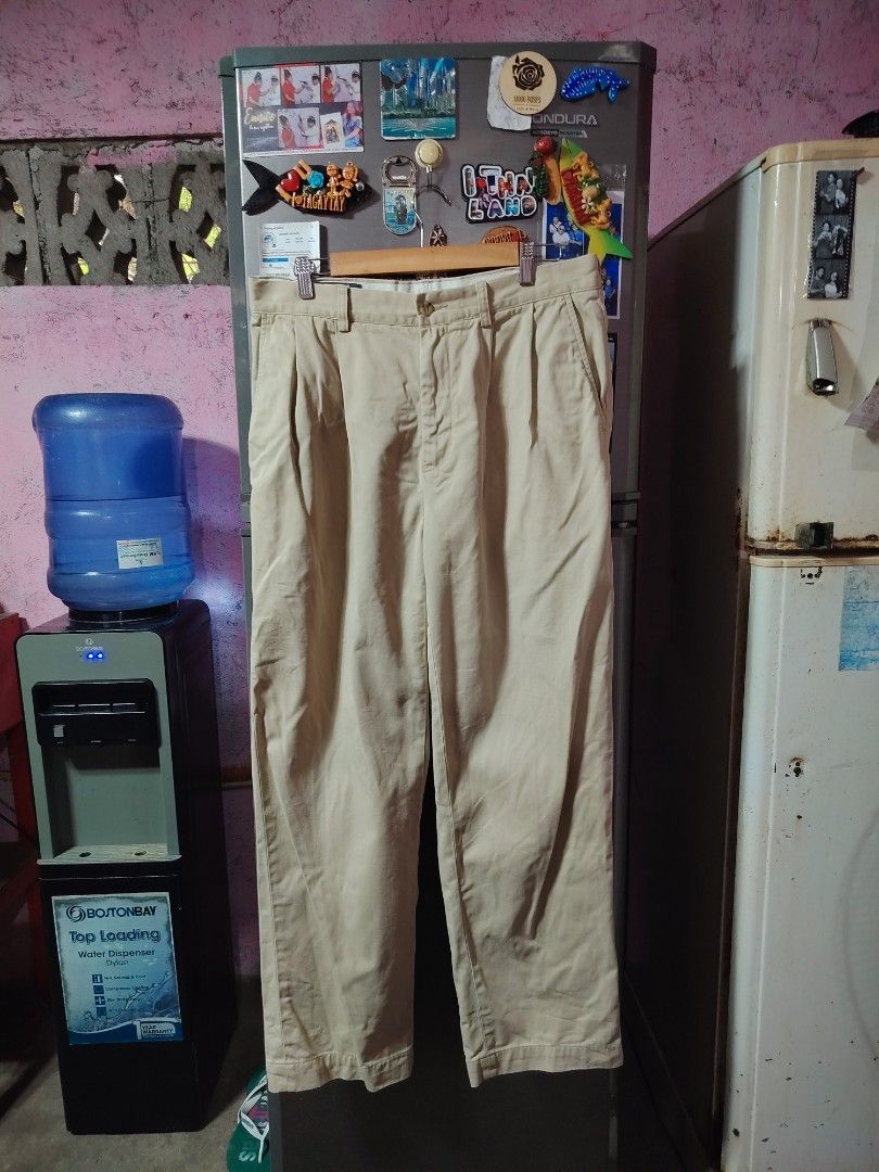 Polo Ralph Lauren Reverse Pleated Pants (Category: Trousers) located in General Santos City (Dadiangas). Submitted by rafaelmir09800 (Listing ID 1463965140, Image 1). Description: - Polo Ralph Lauren Khaki Pants - Size 34 on tag (34/32) - Style: Reverse Pleated Prospect Pant - Material: 100% Cotton - Fit: Classic Fit - Closure: Button at waist - Pockets: Two back pockets, one with button closure - Detail: Embroidered iconic Polo player logo on ba