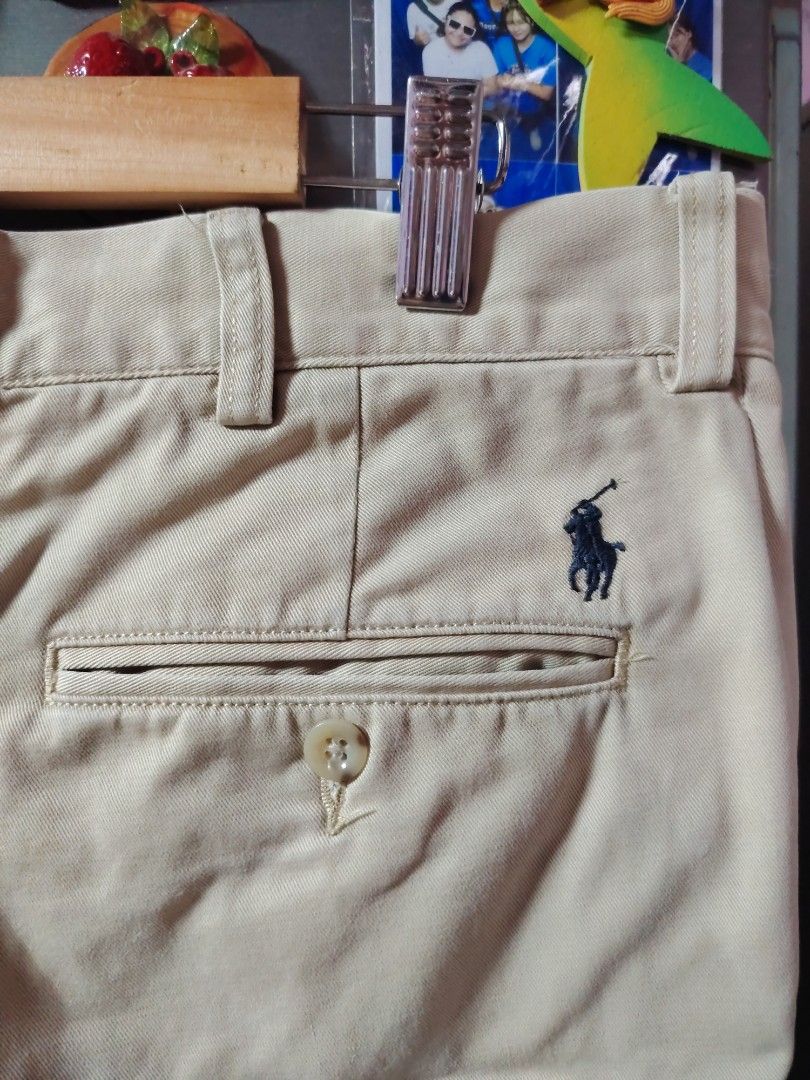 Polo Ralph Lauren Reverse Pleated Pants (Category: Trousers) located in General Santos City (Dadiangas). Submitted by rafaelmir09800 (Listing ID 1463965140, Image 3). Description: - Polo Ralph Lauren Khaki Pants - Size 34 on tag (34/32) - Style: Reverse Pleated Prospect Pant - Material: 100% Cotton - Fit: Classic Fit - Closure: Button at waist - Pockets: Two back pockets, one with button closure - Detail: Embroidered iconic Polo player logo on ba