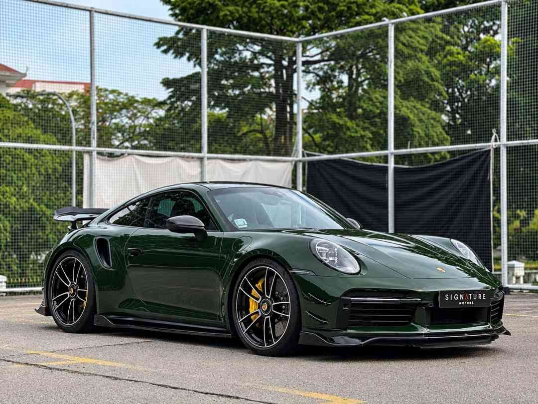 PORSCHE 911 TURBO S SES (992) (Category: Used Cars) located in Singapore. Submitted by signaturemotors (Listing ID 1463960012, Image 2). Description: Showroom: 237 ALEXANDRA ROAD 237 Alexandra Road #02-04 Singapore 159929 Rare Agent Unit! Old Scheme! High ARF! 50% Parf With No Capped! Nicely Wrapped 992 Coupe Turbo S. Come With 5 Years Agent Warranty & Free Servicing Till March 2028. Porsche Active Aerodynamics. Porsche Dynamic Chassis Control (P