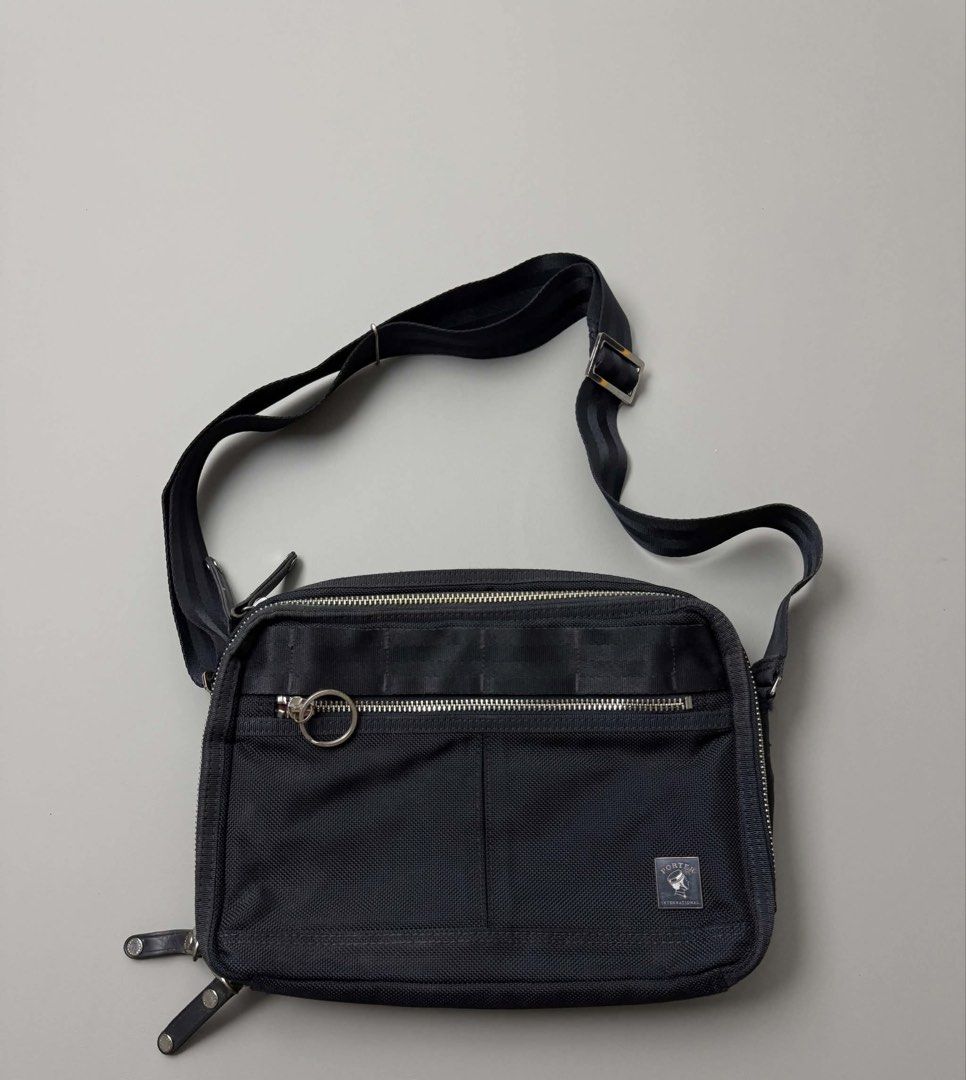 PORTER INTERNATIONAL (Category: Sling Bags) located in Guagua. Submitted by sweetboyy (Listing ID 1464062947, Image 1). Description: PORTER INTERNATIONAL NEW HEAT SLING BAG.