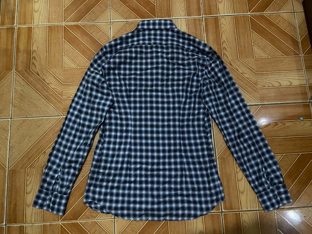PRADA Blue/Navy/White Check Button-Down Longsleeve Size 41/16 (Category: Coats, Jackets and Outerwear) located in Paranaque City. Submitted by jnthn.c (Listing ID 1464052841, Image 2). Description: PRADA Blue/Navy/White Plaid Button-Down Longsleeve Size 41/16 on Tag Actual Size: 30 x 19 fits on Large to XL Issue: Nagdikit yung Tag need iFlashlight para mabasa, Need wash & Need plantsa.