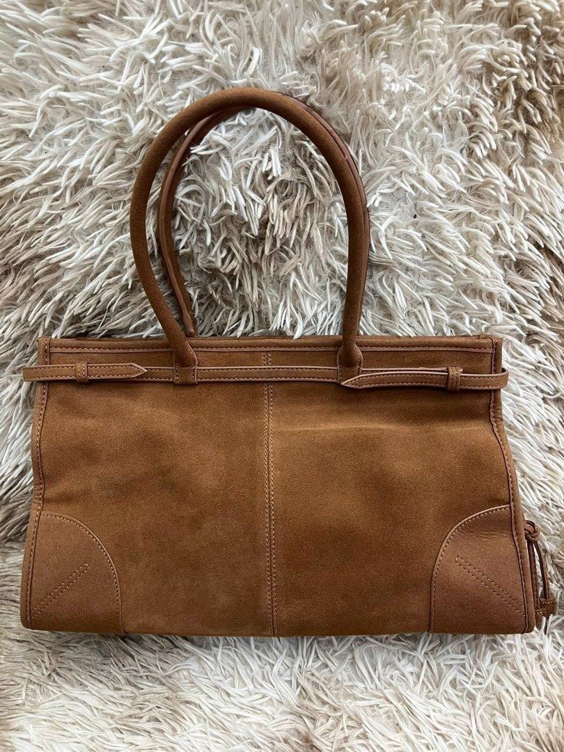 Prada Bonnie Large Suede (Category: Tote Bags) located in Manila. Submitted by bagsandmanymanymore1 (Listing ID 1464030002, Image 3). Description: Prada Suede Handbag -Size 38cm -Metal hardware -Zipper closure -Nappa leatherand logo print nylon lining with zipper -Leather handles, drop 22cm -Enameled metal triangle logo on th front Please read before you order 👉🏻❗️Payment first before shipping ❗️Cut off time of payment 11am sameday delivery ❗️N
