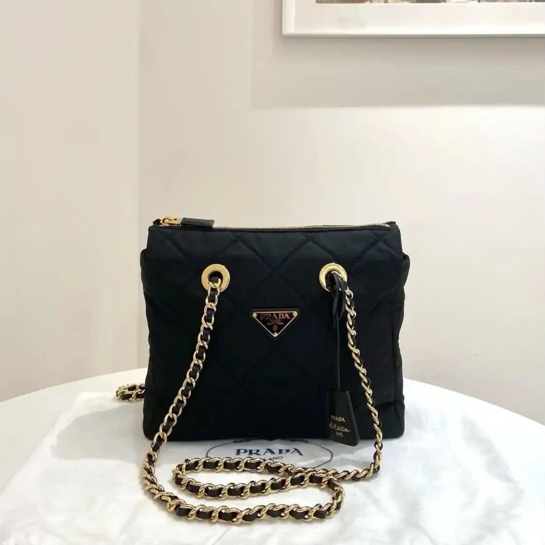 Prada Quilted Nylon Chain Shoulder Bag Black Gold Hardware (Category: Luxury Bags & Wallets) located in Paoay. Submitted by rvf1230 (Listing ID 1463970554, Image 1). Description: - Authentic Black Prada Bag - Quilted Nylon Material - Gold Chain Strap and Hardware - Secure Zipper Closure - Includes Original Leather Tag - Dust Bag Included (as shown in photos) - Ideal for Everyday Use.
