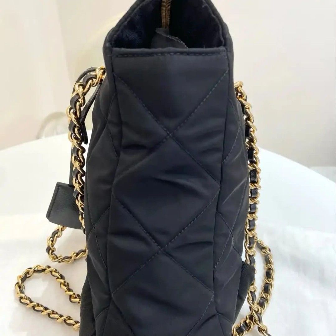 Prada Quilted Nylon Chain Shoulder Bag Black Gold Hardware (Category: Luxury Bags & Wallets) located in Paoay. Submitted by rvf1230 (Listing ID 1463970554, Image 2). Description: - Authentic Black Prada Bag - Quilted Nylon Material - Gold Chain Strap and Hardware - Secure Zipper Closure - Includes Original Leather Tag - Dust Bag Included (as shown in photos) - Ideal for Everyday Use.