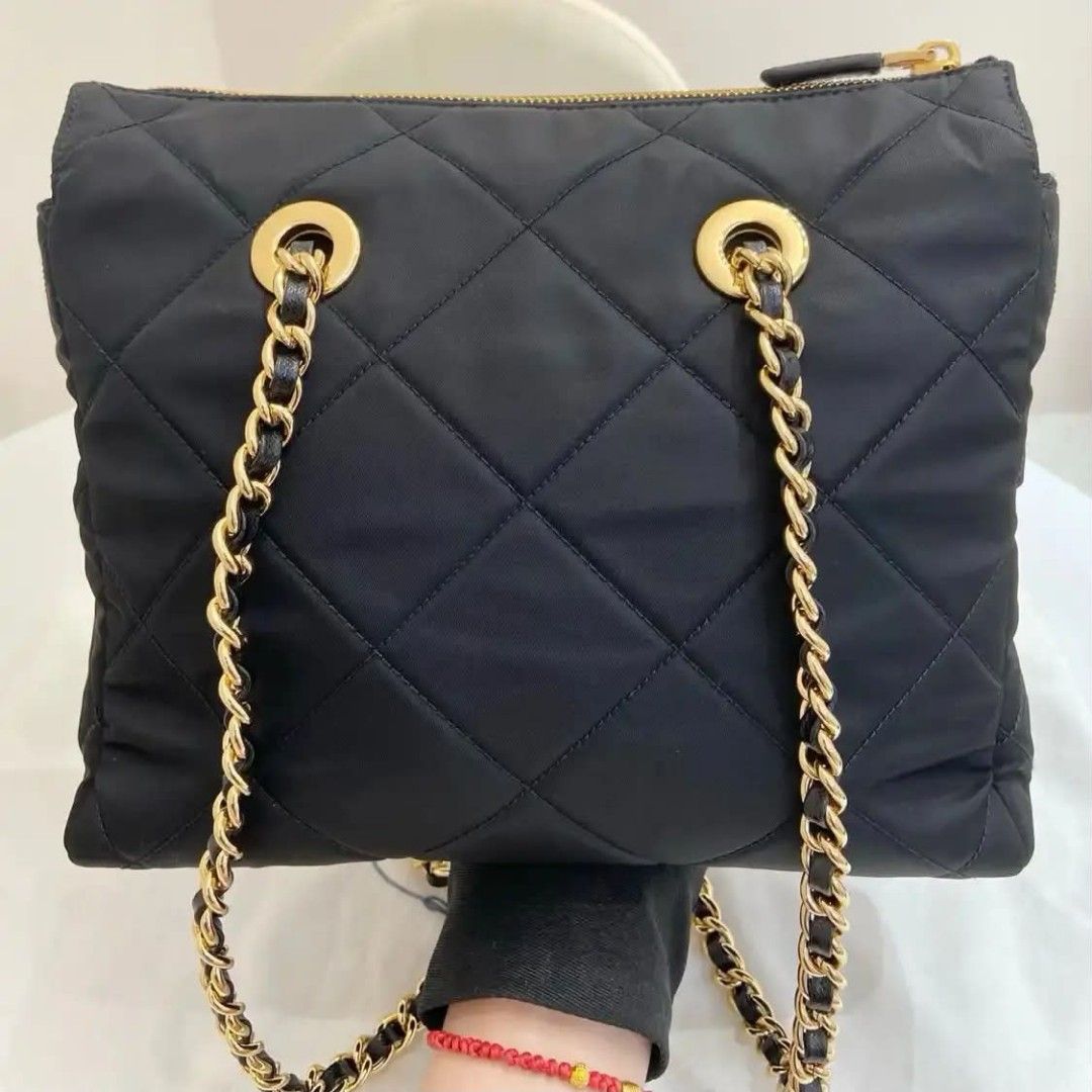 Prada Quilted Nylon Chain Shoulder Bag Black Gold Hardware (Category: Luxury Bags & Wallets) located in Paoay. Submitted by rvf1230 (Listing ID 1463970554, Image 3). Description: - Authentic Black Prada Bag - Quilted Nylon Material - Gold Chain Strap and Hardware - Secure Zipper Closure - Includes Original Leather Tag - Dust Bag Included (as shown in photos) - Ideal for Everyday Use.