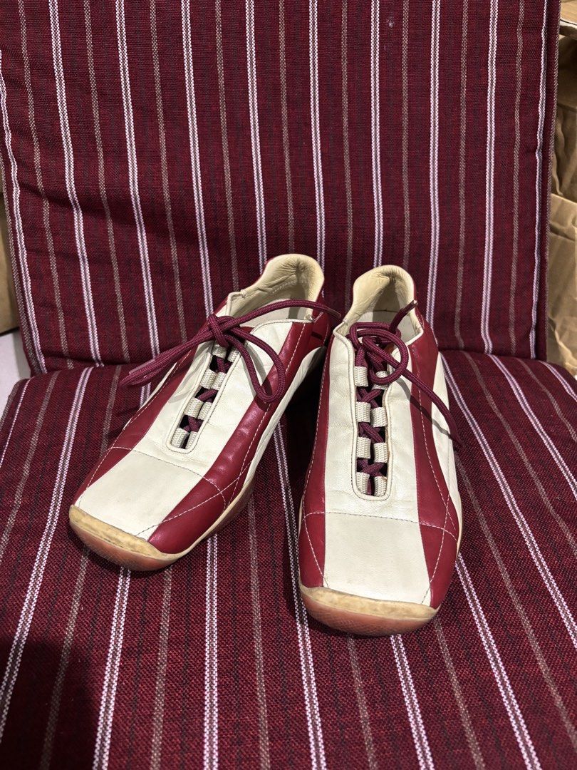Prada sneakers (Category: Sneakers & Footwear) located in Calamba. Submitted by alnsurplus.028 (Listing ID 1464069679, Image 2). Description: Prada Sport red and white leather square-toe sneakers or bowling shoes from the early 2000s Normal signs of used In good condition We ship nationwide Loc: Calamba, Laguna .