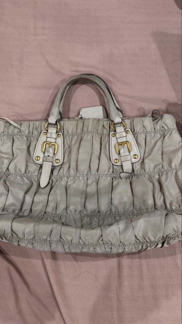 Prada Tessuto Gaufre Satchel (Category: Luxury Bags & Wallets) located in Manila. Submitted by buys.korean (Listing ID 1464052394, Image 2). Description: Prada Tessuto Gaufre Satchel Issues: signs of usage and stain with authenticity card Location: Banawe, QC negotiable Location: Banawe,QC.