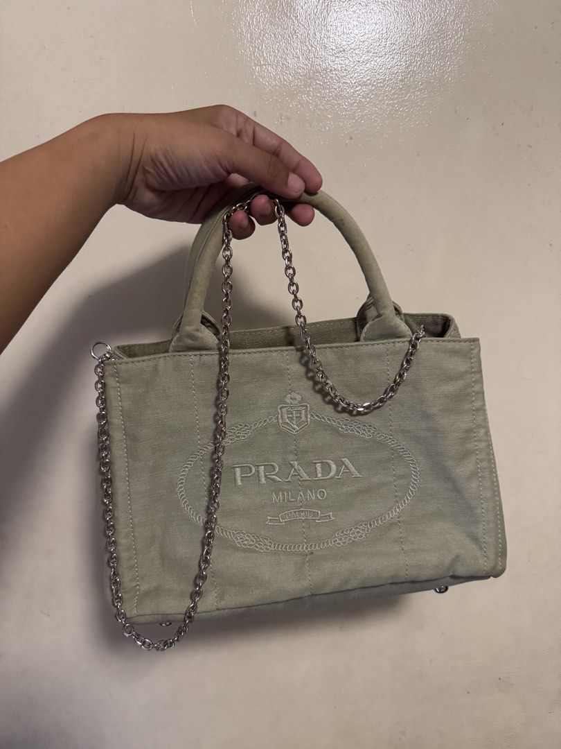 Prada Tote With Chain Sling (Category: Luxury Bags & Wallets) located in Davao. Submitted by cmbs141022 (Listing ID 1463939589, Image 1). Description: Prada Tote With chain sling Condition: lightly used (9/10) Dm for more inquries.