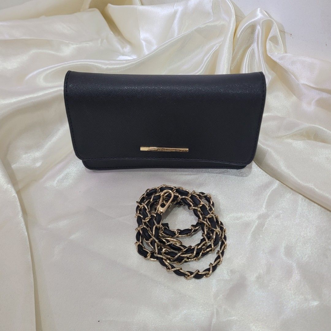 PRE-LOVED MCLANEE SLING (Category: Luxury Bags & Wallets) located in Dasmarinas. Submitted by bome1 (Listing ID 1464016743, Image 1). Description: GOOD CONDITION LIKE NEW.