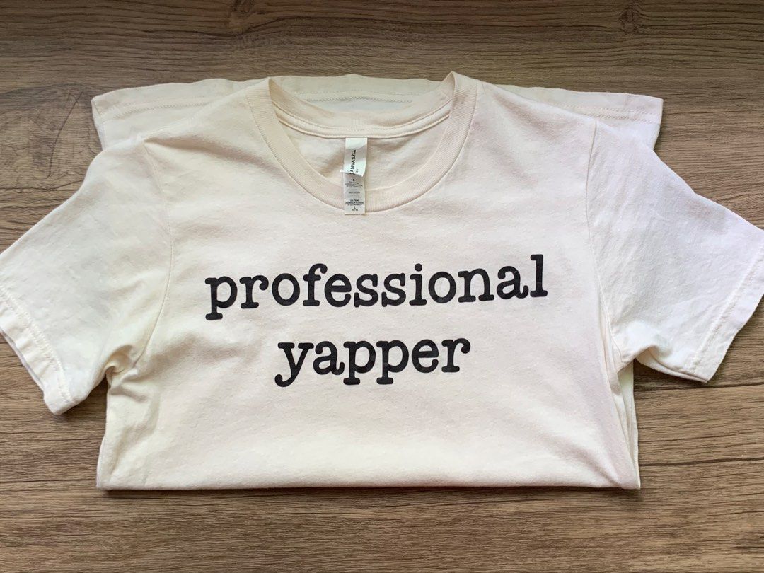 ’professional yapper’ Cream Bella+Canvas Statement Tee (Category: Shirts) located in Vigan. Submitted by sweeeeeteclairs (Listing ID 1463995252, Image 1). Description: Size L on tag but best fits XS - S.