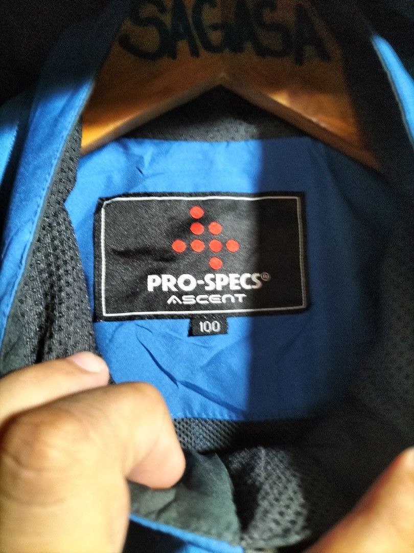 PRO-SPECS ASCENT Blue Hooded Jacket (Category: Coats, Jackets and Outerwear) located in Valencia. Submitted by cabisaythriftshop (Listing ID 1463986224, Image 3). Description: - PRO-SPECS ASCENT blue hooded jacket - Zipper closure - Multiple zippered pockets - Grey mesh inner lining - Ideal for outdoor activities - Size: 100 Prospecs Water Resistance Xlarge 29L*24W Excellent Condition.