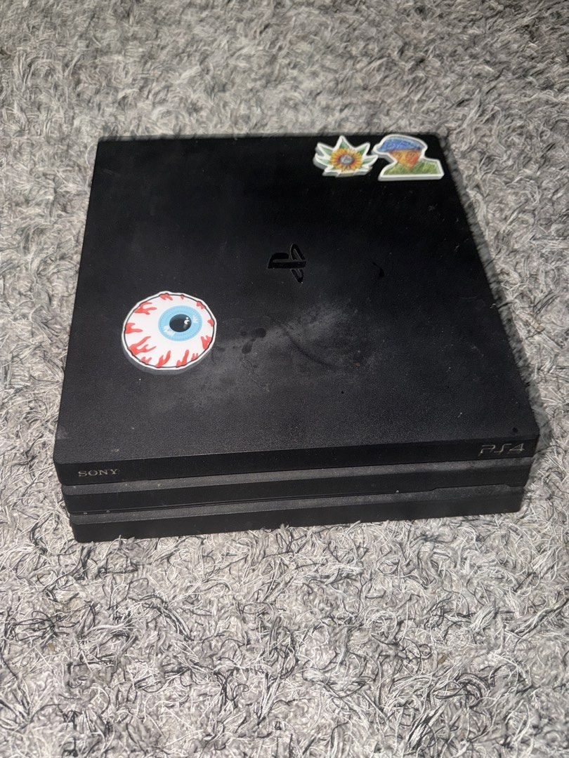 PS4 Pro Console Bundle with 2 Controllers & Games (Category: PlayStation) located in San Pedro. Submitted by dennis697 (Listing ID 1464110473, Image 3). Description: - PlayStation 4 Pro Console - Two DualShock 4 Controllers (1 Gold, 1 Camouflage) - Games Included: Call of Duty, FIFA 20, NBA 2K19 - Controller Charging Stand - Everything you need to start gaming! - Note: Console has some stickers on it..