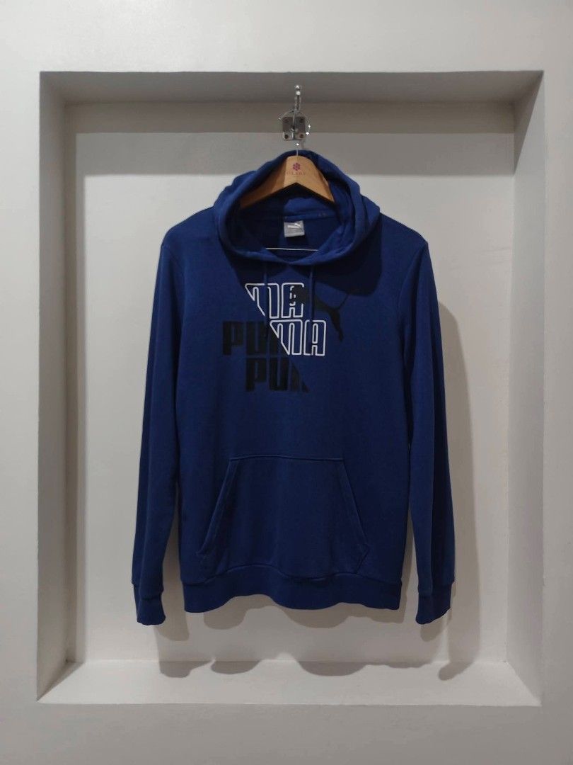 Puma Blue Hoodie with Logo (Category: Coats, Jackets and Outerwear) located in Caloocan City. Submitted by clprelovedclothing (Listing ID 1464072864, Image 1). Description: - Blue Puma hoodie - Large graphic logo on the front - Long sleeves - Front pocket - Ideal for casual wear - Comfortable and stylish - Ready for a new owner.
