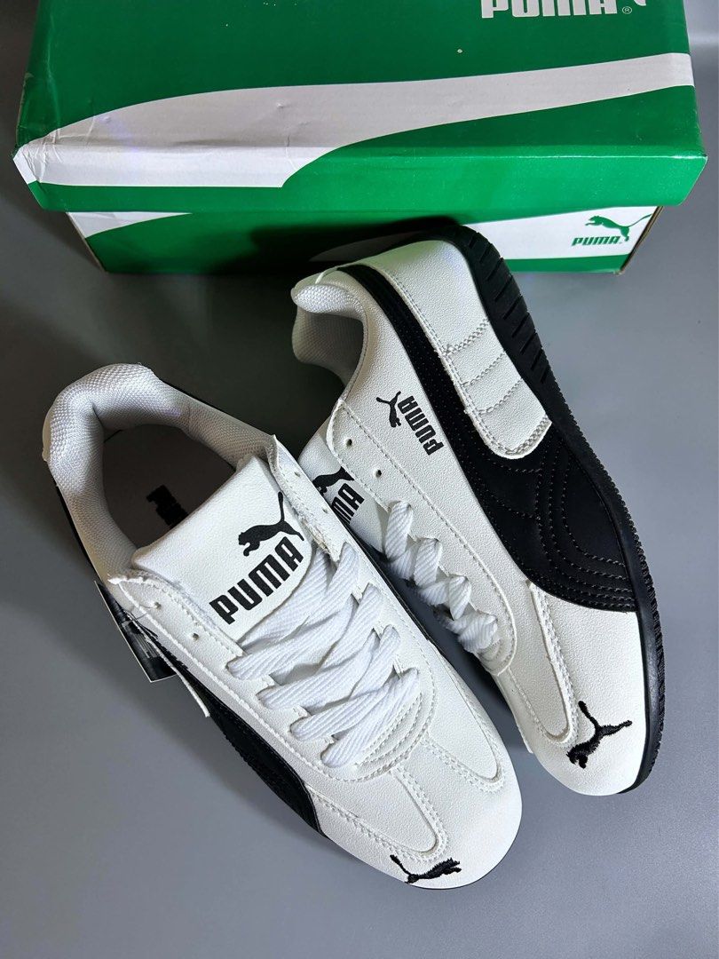 Puma White and Black Sneakers (Category: Sneakers) located in Rizal. Submitted by sakre (Listing ID 1463996602, Image 2). Description: - Classic Puma sneakers - White with black accents - Secure lace-up closure - Visible Puma logo on side and tongue - Comes with original box - Ideal for casual wear.