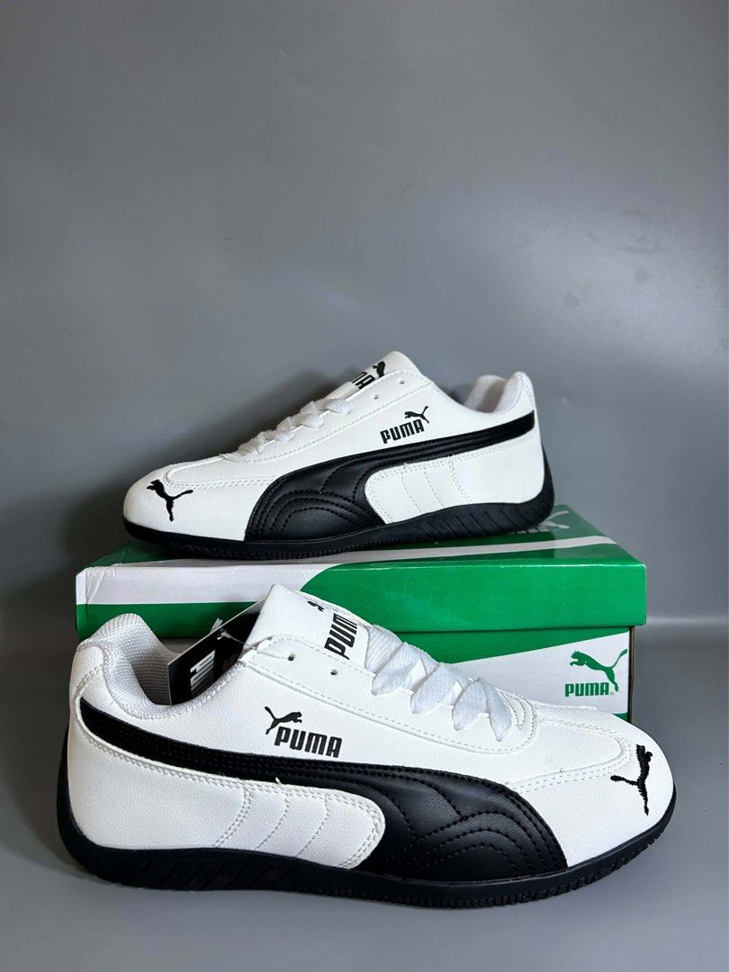 Puma White and Black Sneakers (Category: Sneakers) located in Rizal. Submitted by sakre (Listing ID 1463996602, Image 1). Description: - Classic Puma sneakers - White with black accents - Secure lace-up closure - Visible Puma logo on side and tongue - Comes with original box - Ideal for casual wear.