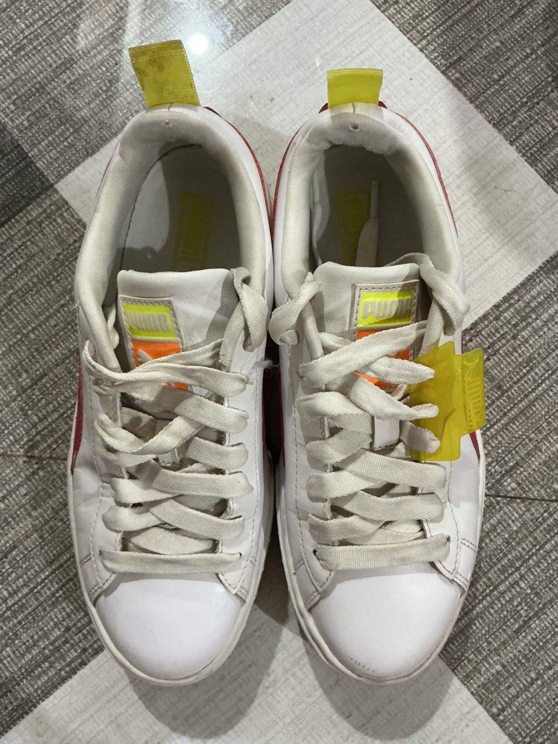 Puma White Pink Orange Platform Sneakers Size 7 (Category: Sneakers) located in Bocaue. Submitted by bajiborgy08 (Listing ID 1464033781, Image 1). Description: - White Puma sneakers - Pink and orange accents - Platform sole - Lace-up closure - Yellow pull tabs at the heel - Made in Vietnam - Size 235 (23.5cm).