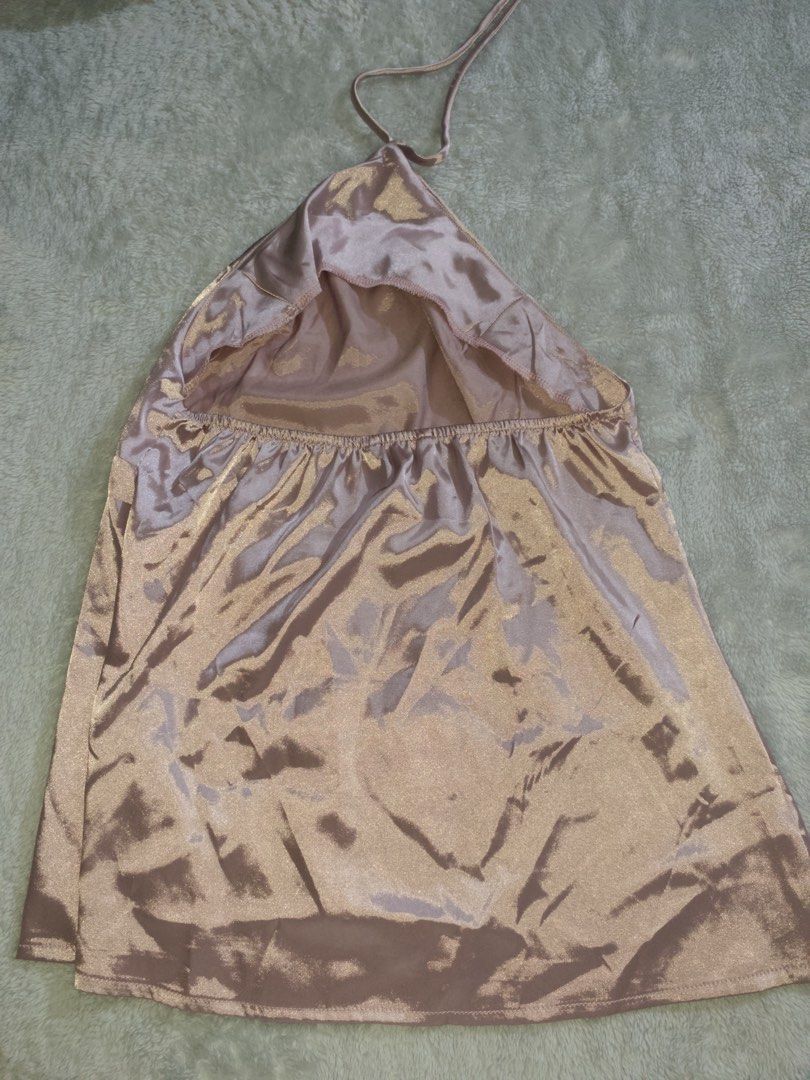 purple-ish pink vintage silk backless top (Category: Sleeveless) located in Manila. Submitted by thelittlearchiveofelle (Listing ID 1464032368, Image 2). Description: bought it for over 300+ in BSCO (they dont sell the same style anymore). new and never been worn. perfect for casual wear or to pair with skirt. rfs - not my style anymore.