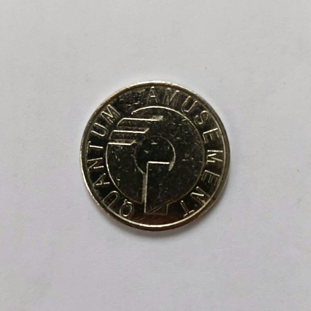 Quan Tum Amusement Token (Category: Vintage Collectibles) located in Bacoor. Submitted by hazirannei (Listing ID 1464072905, Image 1). Description: - Quan Tum Amusement token - Features Quan Tum Amusement logo on one side - Eagle design on the other side - Ideal for collectors or as a unique item RfS: Decluttering MoP: GCash MoD: LBC, J&T Express or Buyer's preferred Courier if thru online booking. Shipping Fee at Buyer's expense. Note: Images we