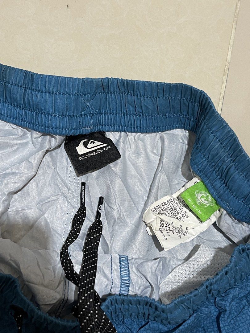 Quiksilver Blue Gradient Swim Shorts Size Medium (Category: Swim Trunks & Board Shorts) located in Manila. Submitted by micoletszx81430 (Listing ID 1464073224, Image 2). Description: - Quiksilver Swim Shorts - Size: Medium - Color: Blue Gradient - Waistline: 28-33 inches - Length: 15.5 inches - Features: Drawstring, Back Pocket - Material: Polyester & Elastane - Ideal for: Beach or Pool.