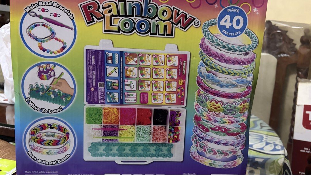 Rainbow Loom Deluxe Bracelet Making Kit (Category: Craft Supplies & Tools) located in Manila. Submitted by lizziedear.lizziedear (Listing ID 1463997137, Image 2). Description: - Direct From USA -Brand New - Rainbow Loom Deluxe Bracelet Making Kit - Includes 2 Happy Looms - Comes with 2000 mixed color bands - Features 100 pony beads for customization - 1 Storage Case - All items neatly stored in a convenient case - Create up to 40 unique bracelets