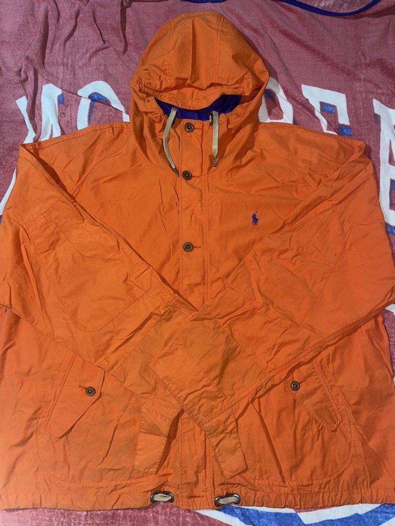 Ralph Lauren Orange Nylon Buttoned Jacket (Category: Coats, Jackets and Outerwear) located in Baler. Submitted by salvie.moon (Listing ID 1464053107, Image 3). Description: Thick Nylon Heavy Metal Zip Buttoned Fastenings Embroidered Ralph Lauren Polo Size : 3XB big Width: 31 Length: 31 Condition : In good condition, some light marks .