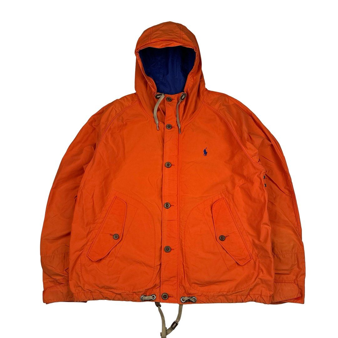 Ralph Lauren Orange Nylon Buttoned Jacket (Category: Coats, Jackets and Outerwear) located in Baler. Submitted by salvie.moon (Listing ID 1464053107, Image 1). Description: Thick Nylon Heavy Metal Zip Buttoned Fastenings Embroidered Ralph Lauren Polo Size : 3XB big Width: 31 Length: 31 Condition : In good condition, some light marks .