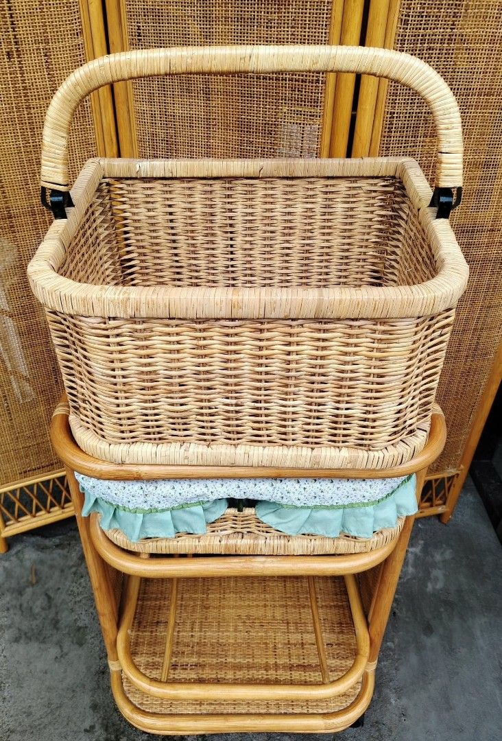 Rattan Laundry Basket (Category: Bathroom & Kitchen Fixtures) located in Taguig. Submitted by sydney08.owl (Listing ID 1463993749, Image 3). Description: Storage Organizer Cart with Fabric Basket, with wheels. 📏 Size: L-20" × W-14" × H-32" ✨ Beautiful vintage-style rattan design 🧺 2 spacious baskets + lower shelf 🛞 With wheels — easy to move around 💸 Php3500 negotiable 💚 Perfect for bedroom, bathroom, nursery, or living room storage.