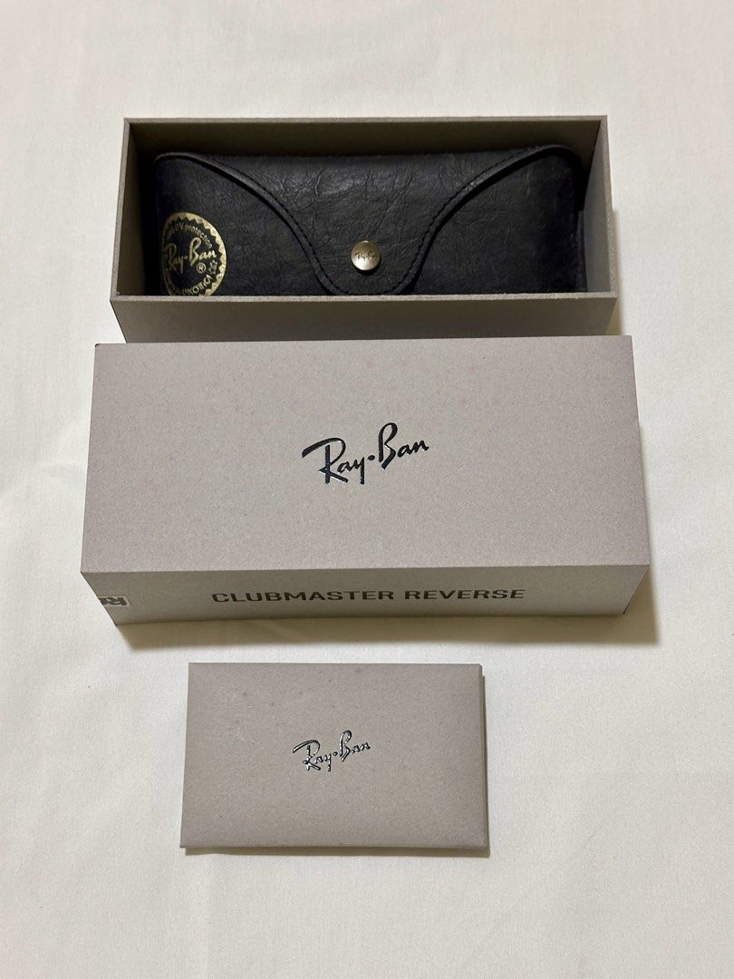 Ray-Ban Clubmaster Reverse Sunglasses (Category: Sunglasses & Eyewear) located in General Trias. Submitted by milcoxx (Listing ID 1464070810, Image 3). Description: - Authentic Ray-Ban Clubmaster Reverse Sunglasses - Color: Black frame with gold accents - Includes original box and case - Model: RB0504S 6077/VR 54 21 145 3N - Ideal for everyday wear Preloved. Maalaga sa gamit. SRP P15,990 RFS: need cash.