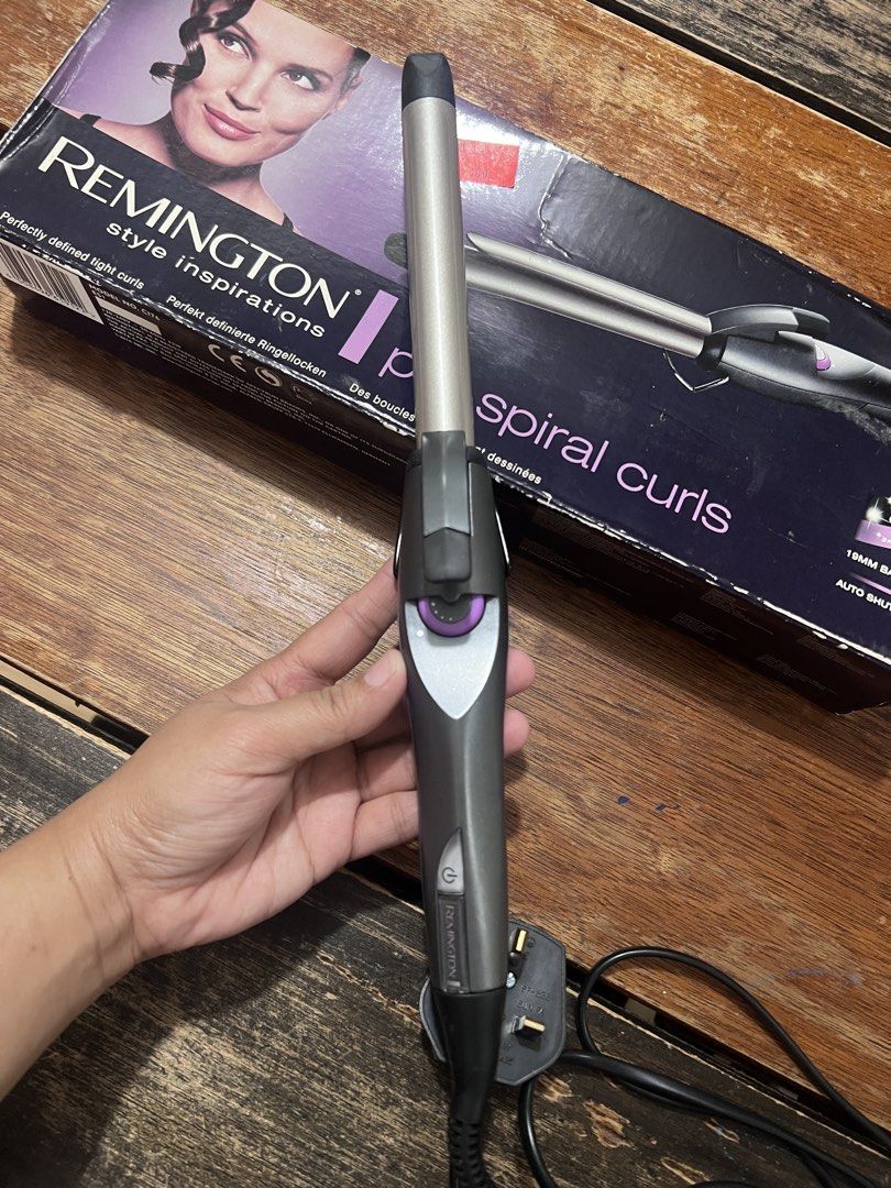 Remington Spiral Curls Iron (Category: Hair Accessories) located in Bacoor. Submitted by momofkas2 (Listing ID 1463947749, Image 3). Description: Bought abroad. Naitago lang ng matagal. Perfectly working in bnew condition..