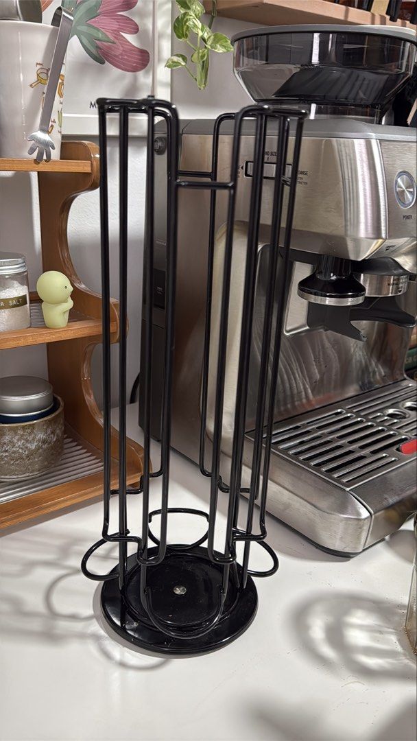 Rotating Coffee Pod Holder 2pcs (Category: Coffee Machines & Makers) located in Manila. Submitted by shopwithsjc (Listing ID 1463954587, Image 1). Description: - Sturdy black metal construction - Rotating design for easy access - Holds a large number of coffee pods - Keeps your coffee station organized - Compact size fits nicely on countertops.