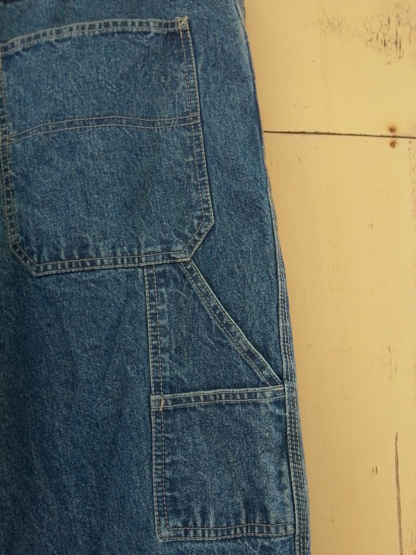 Route 66 Denim Carpenter Jeans - Blue (Category: Jeans) located in Bantayan. Submitted by markjimenez1975557 (Listing ID 1464036650, Image 3). Description: excellent no issue waist 36-38 length 41 - Classic blue denim carpenter jeans - Relaxed fit for comfort - Multiple pockets for practicality - Includes a hammer loop - Durable and versatile for work or casual outings - Waistband and belt loops are intact - Hemmed bottom.