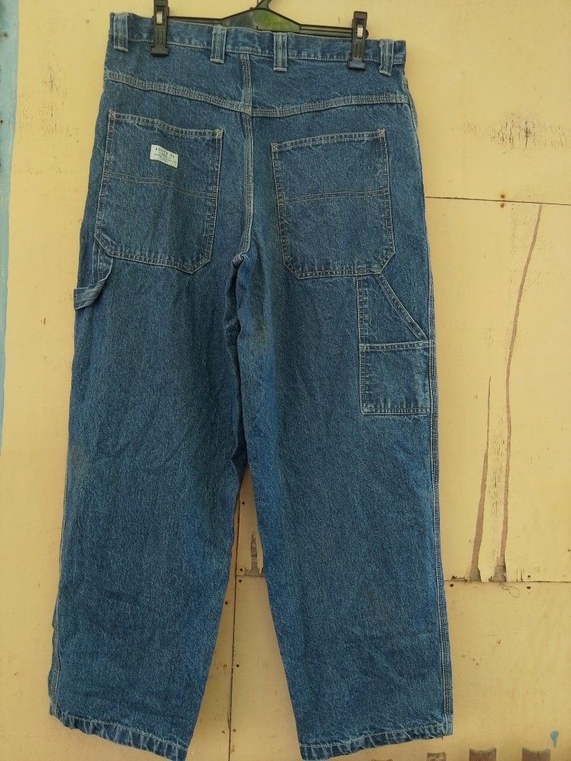 Route 66 Denim Carpenter Jeans - Blue (Category: Jeans) located in Bantayan. Submitted by markjimenez1975557 (Listing ID 1464036650, Image 2). Description: excellent no issue waist 36-38 length 41 - Classic blue denim carpenter jeans - Relaxed fit for comfort - Multiple pockets for practicality - Includes a hammer loop - Durable and versatile for work or casual outings - Waistband and belt loops are intact - Hemmed bottom.