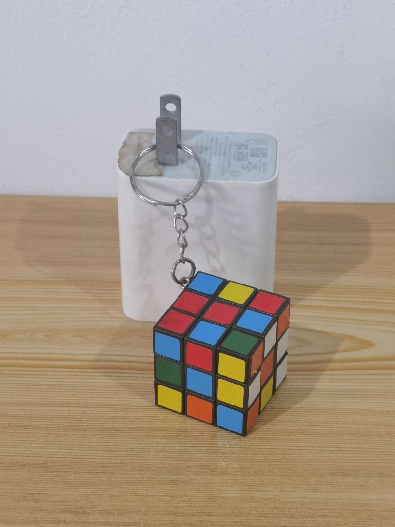 Rubik's Cube Keychain (Category: Board Games & Puzzles) located in Taguig. Submitted by kalabasza (Listing ID 1463985946, Image 1). Description: 📌 This is a preloved item. Please manage your expectation. 📌 Actual item posted. 📌 Item is in good condition. 📌 Product Color may slightly vary due to Photographic Lighting. 📌 Location: Taguig 📌 MOP: GCash. Payment first before ship. 📌 MOD: J&T, LBC, GoGo or Lalamove. 📌 DF/SF at buyer's expense. 