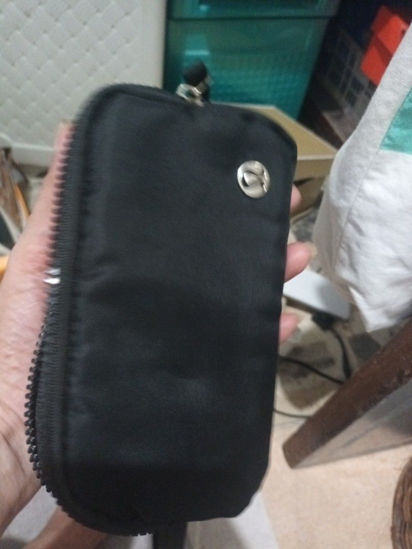 Rush sale (Category: Cross-body Bags) located in Muntinlupa City. Submitted by youngforest_acb081 (Listing ID 1463973490, Image 3). Description: sling bag pouch bag both auth pouch u can keep your celpon anf charger.