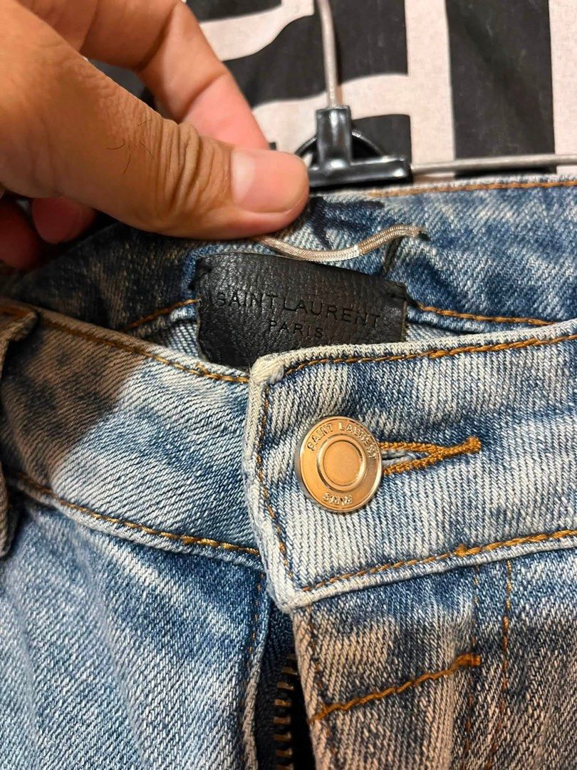 Saint Laurent Distressed jeans (Category: Activewear) located in Manila. Submitted by bibiies2.0xghettothrift (Listing ID 1463963461, Image 3). Description: Saint Laurent Distressed jeans Details W32 Stretcchable L41 ₱850 Loc.Baclaran Paranaque.