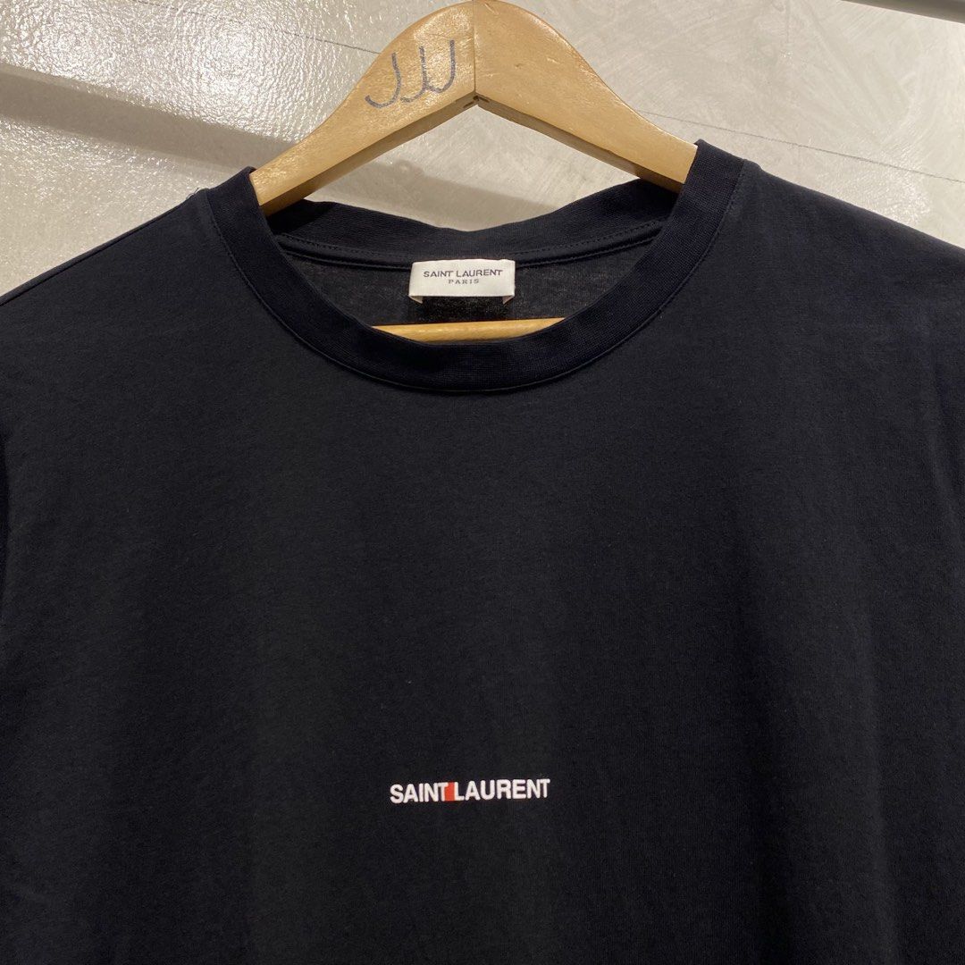 Saint Laurent Paris Shirt (Category: Luxury Apparel) located in Quezon City. Submitted by rebirthalley (Listing ID 1463998009, Image 3). Description: Width-18 Length-24.5 Sleeve-6.5 Shoulder-16 Hem-17.5 Excellent Condition No flaws.