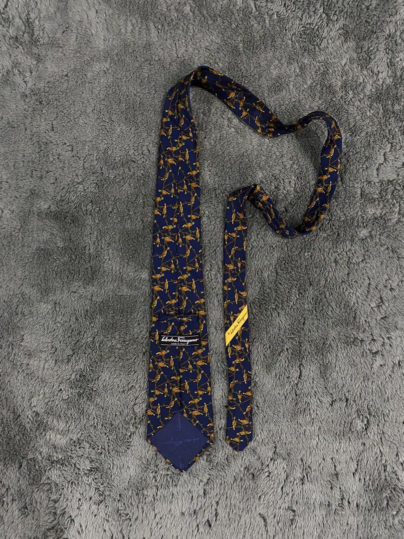 Salvatore Ferragamo silk tie (Category: Luxury Accessories) located in Leganes. Submitted by wisehandpick (Listing ID 1464086001, Image 2). Description: Salvatore Ferragamo silk tie featuring an intricate equestrian motif made in Italy. (Authentic) .