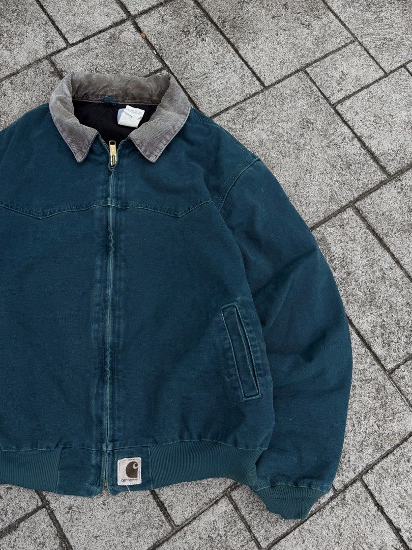 Santa fee carhartt (Category: Coats, Jackets and Outerwear) located in Candelaria. Submitted by ballerthrift796 (Listing ID 1463952428, Image 2). Description: Santa fee Detroit carhartt Excellent condition Issue expired patch i hole part of sleeve W-25 L-28.