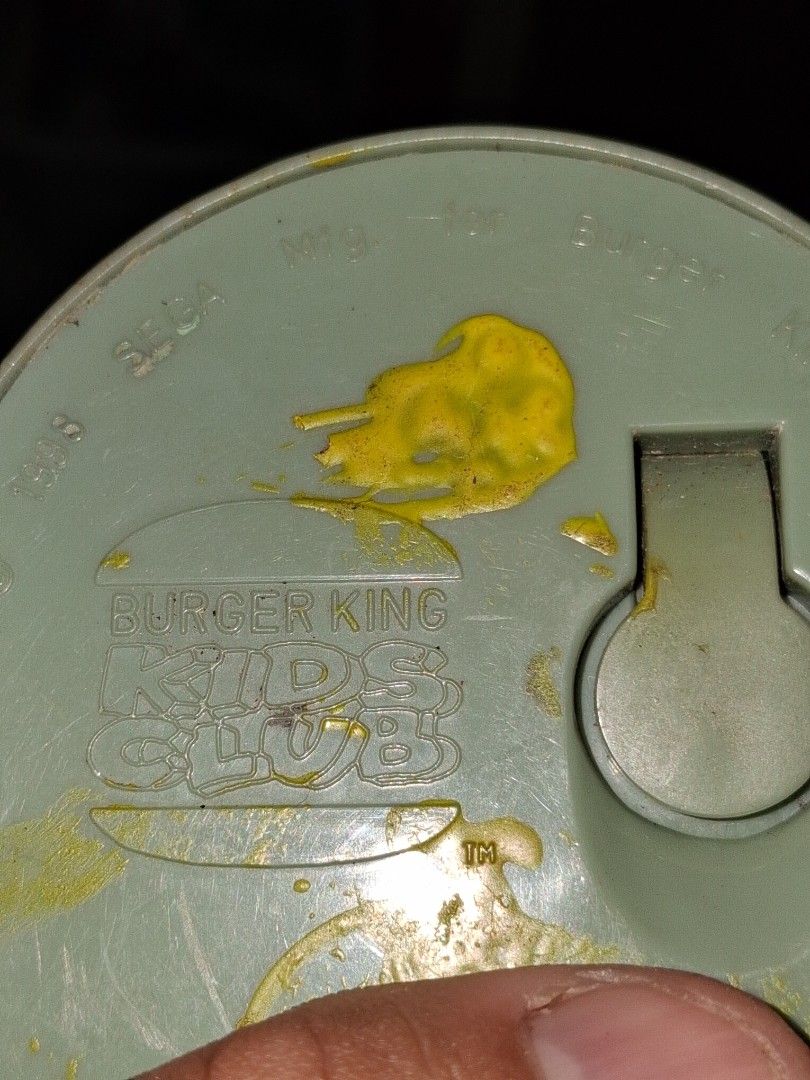 Sega Burger King sonic r.robotnic 1998 (Category: Vintage Collectibles) located in Manila. Submitted by marcas022798212 (Listing ID 1464047042, Image 3). Description: - Vintage Sega toy from Burger King Kids Club - Features Sonic the Hedgehog inside a clear dome - Plastic shows some yellowing and marks - Dried yellow residue on the bottom (possible packaging/condiment stain) - Fun collectible for Sonic fans and 90s fast food toy enthusiasts.