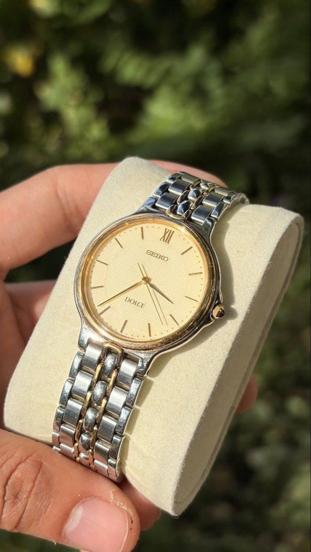 Seiko Dolce Two-Tone Watch (Category: Women's Watches) located in Merida. Submitted by opustimepieces2026 (Listing ID 1464055796, Image 3). Description: - Classic Seiko Dolce watch - Cream dial with Roman numerals - Two-tone stainless steel band with gold accents - Simple and elegant design - Suitable for everyday wear or special occasions - In good working condition.