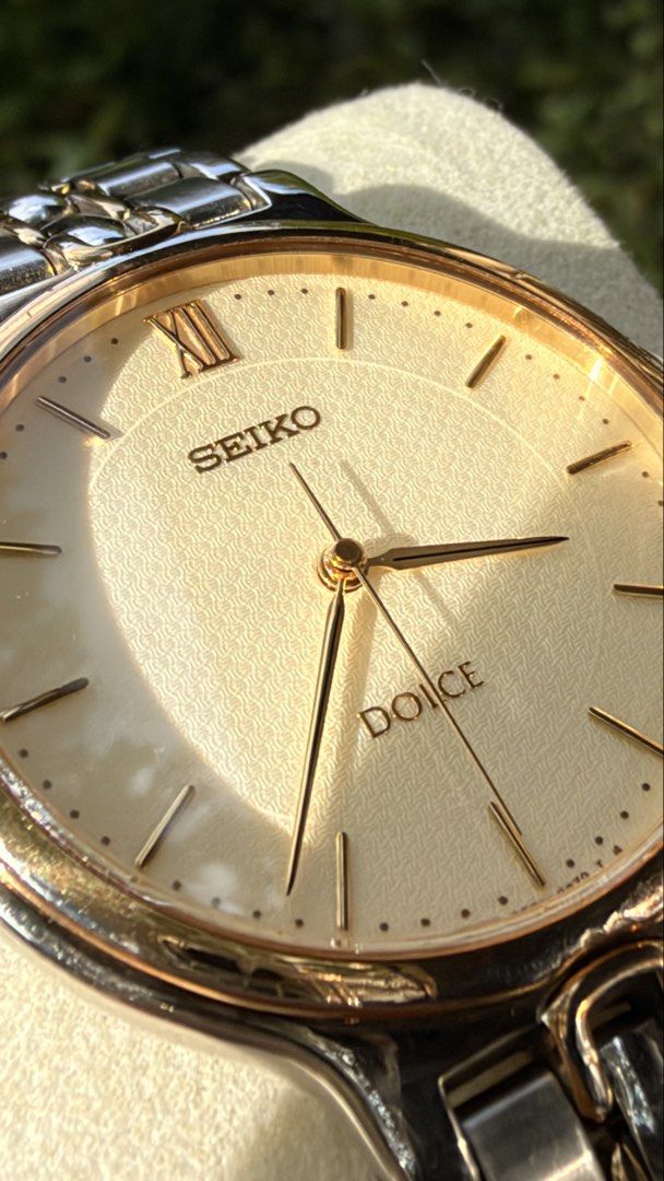 Seiko Dolce Two-Tone Watch (Category: Women's Watches) located in Merida. Submitted by opustimepieces2026 (Listing ID 1464055796, Image 1). Description: - Classic Seiko Dolce watch - Cream dial with Roman numerals - Two-tone stainless steel band with gold accents - Simple and elegant design - Suitable for everyday wear or special occasions - In good working condition.