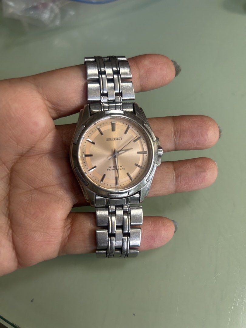 Seiko Kinetic Watch (Category: Men's Watches) located in Cavite. Submitted by mamamia73 (Listing ID 1464036801, Image 1). Description: - Seiko Kinetic watch - Champagne dial - Stainless steel band - Shows some signs of wear on case and bracelet - Watch is functional - Selling as is working replaced strap.