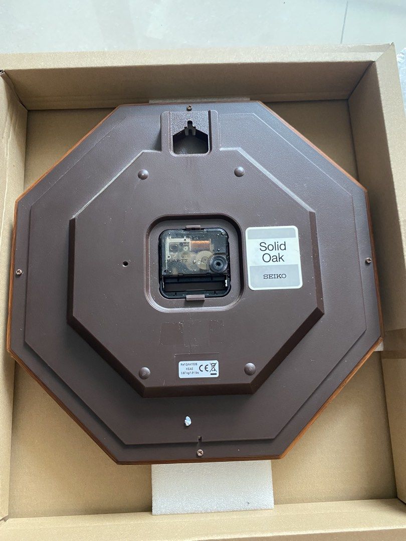 Seiko Octagonal Solid Oak Wall Clock (Category: Clocks) located in Singapore. Submitted by 13bestdeals (Listing ID 1463961503, Image 2). Description: - Genuine Seiko Wall Clock - Solid Oak Frame - Elegant Roman Numeral Display - Includes Original Instruction Manual - Approx. 1 Year Battery Life - Versatile for any room in your home Condition : like new Self Collect in the east or courier .