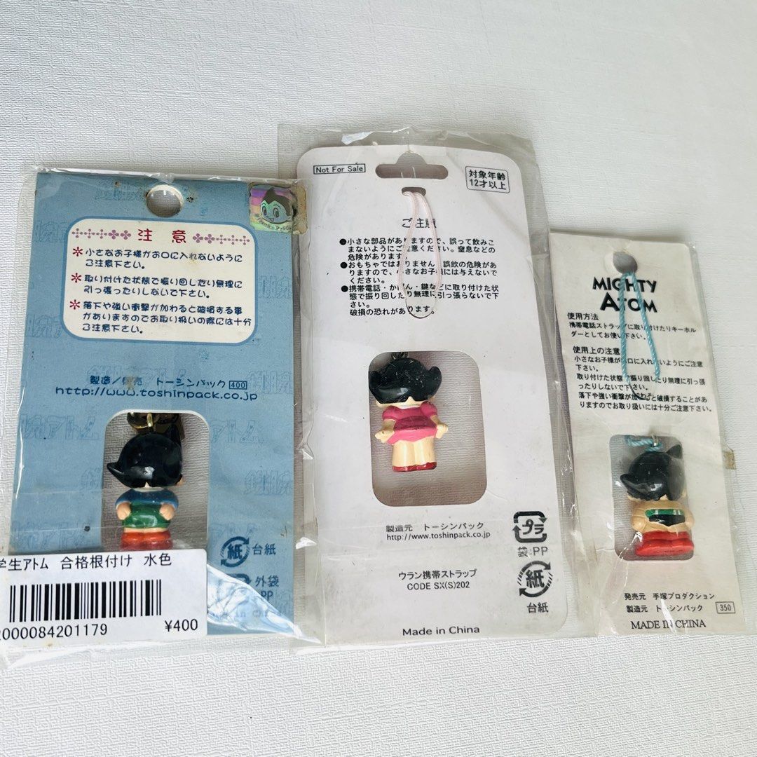 Set of 3 Astro Boy / Mighty Atom Keychains (Category: Character Goods) located in Cabuyao City. Submitted by nyannyancore (Listing ID 1463965549, Image 2). Description: - Set of 3 Astro Boy keychains - Includes Selbex Atom & Uran keychain - Features a 'Gokaku Kigan' good luck charm keychain - Also includes a Mighty Atom keychain - All items are in their original packaging - Ideal for Astro Boy collectors and fans.