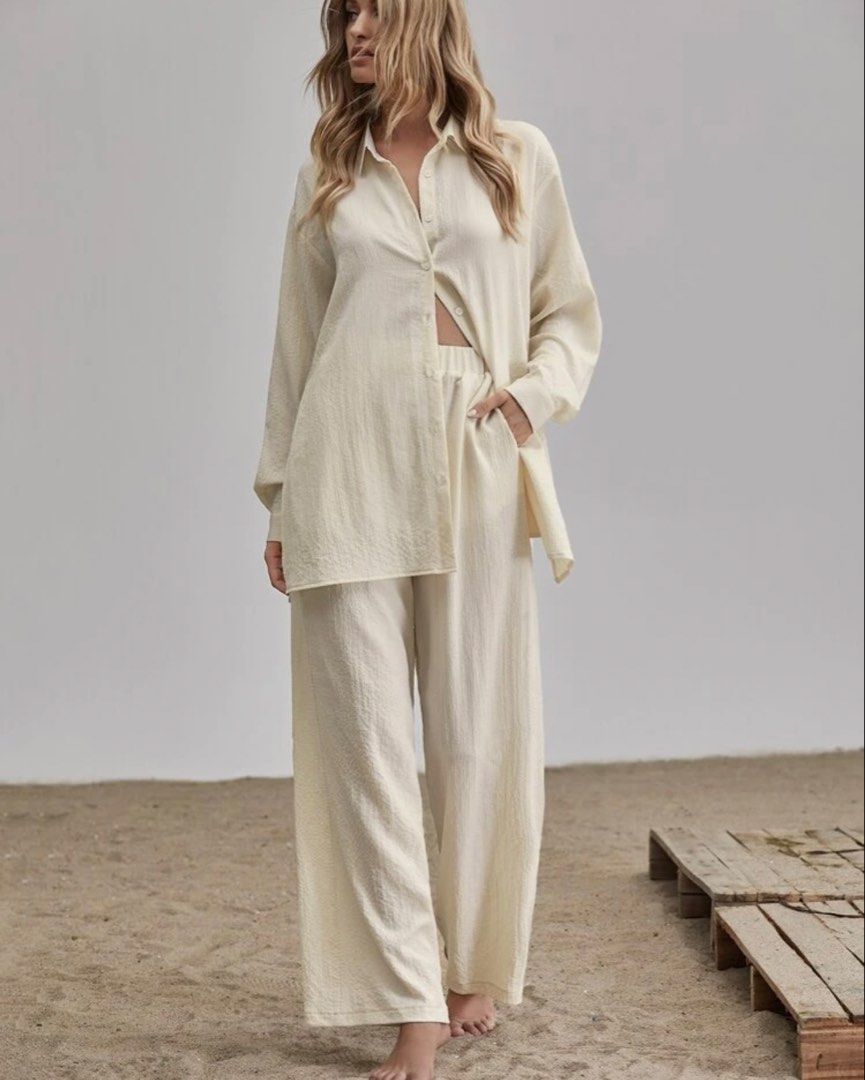 Shein Coords Blouse & Pants (Category: Sets or Coordinates) located in Orani. Submitted by iveecrz (Listing ID 1463992721, Image 2). Description: Fits S-L Cream two-piece set Long sleeve button-up shirt with side slits Matching wide-leg pants.