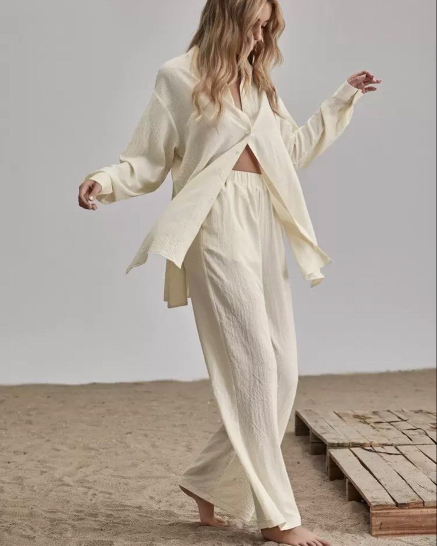 Shein Coords Blouse & Pants (Category: Sets or Coordinates) located in Orani. Submitted by iveecrz (Listing ID 1463992721, Image 3). Description: Fits S-L Cream two-piece set Long sleeve button-up shirt with side slits Matching wide-leg pants.