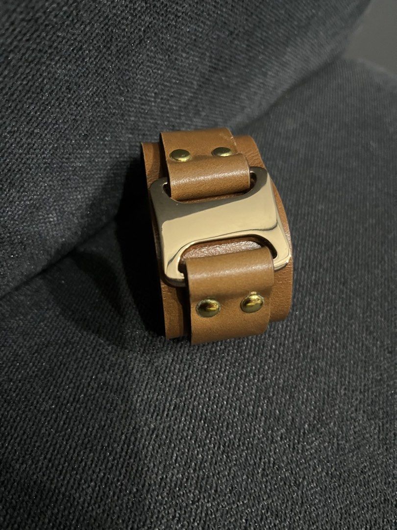 SMALL - Leather Wrist Cuff Bracelet - Brown with Gold hardware (Category: Bracelets) located in Paranaque City. Submitted by regina_sy (Listing ID 1464053849, Image 2). Description: NO issues MOP: GCASH J&T Express delivery (SF c/o BUYER) * Parcel Drop-off (J&T Branch) Saturdays only. NO WW photo 📍MNL .